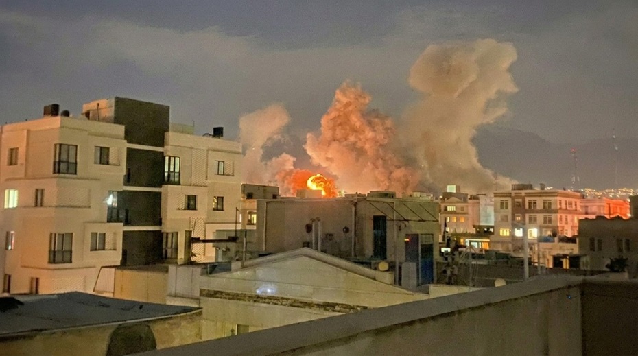 Plumes of smoke rise