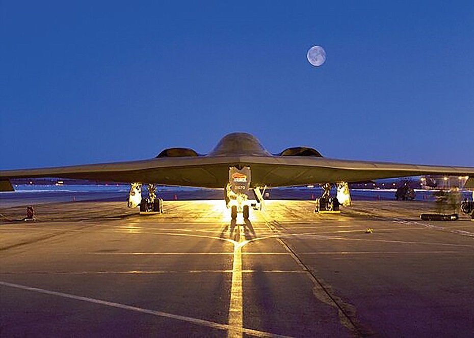 Seven B-2 Spirit bombers, flying east from the US