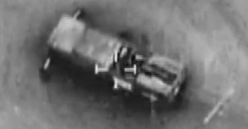 An image from a video released by the IDF on 2 March 2026, showing a vehicle just before being destroyed in Israeli strikes on Iran.