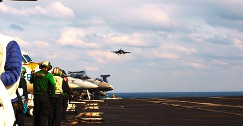 A Super Hornet makes approach to land aboard USS 
        
        , shown here, which is now on its last expected scheduled deployment.