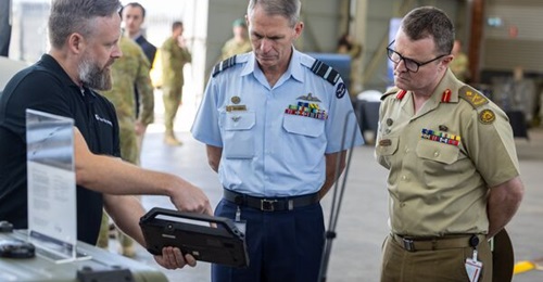 A PentenAmio official presents information about the company's EW system to Australia's Vice Chief of the Defence Force Air Marshal Robert Chipman during an AUKUS 'Maritime Big Play' exercise, which commenced in late 2025, at Fairbairn in Canberra.