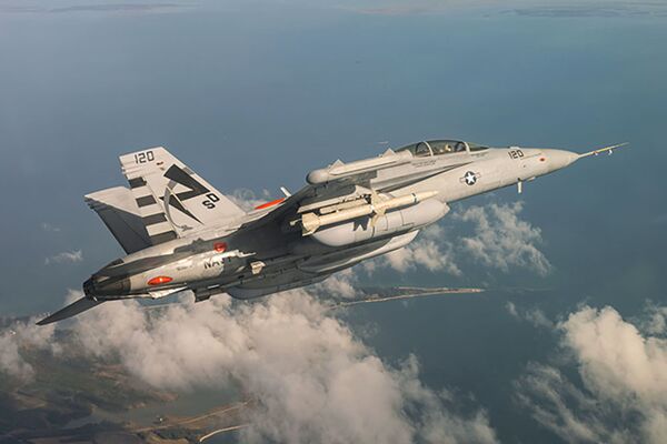 The NGJ-MB seen during flight trials aboard an EA-18G Growler. (Raytheon)