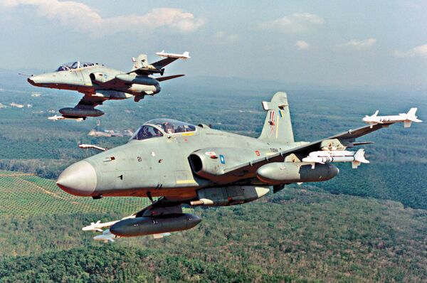 A file image depicting a Royal Malaysian Air Force (RMAF) Hawk 208 in the foreground with a Hawk 108 in the background. The RMAF scrambled its Hawk 208s on 31 May in response to what it considers to be an incursion of Malaysian airspace by 16 PLAAF aircraft. (BAE Systems)