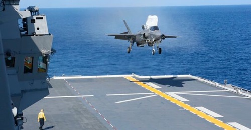 A United States Marine Corps F-35B is pictured conducting take-off and landings in October 2021 from JS 
        
        , the first of two Japanese helicopter carriers that is being converted into a full-fledged aircraft carrier.