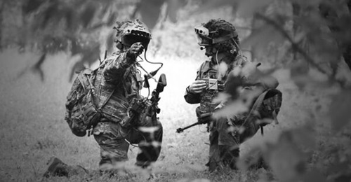 US Army soldiers from the 82nd Airborne Division use an IVAS prototype during a trench-clearing exercise in October 2020 at Fort Pickett in Virginia. The system is poised to begin operational testing in May 2022.