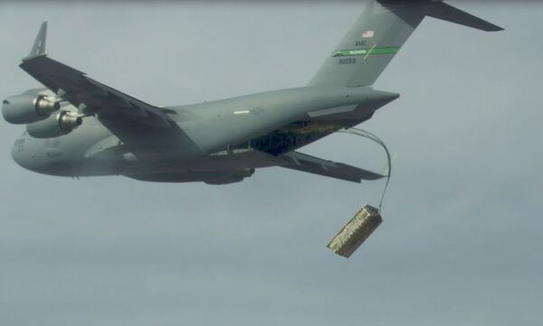 A high altitude airdrop of palletised munitions (JASSM simulants) from a C-17 using standard operational airdrop procedures is conducted during the USAF's Advanced Battle Management Family of Systems (ABMS) Onramp #2 exercise in September 2020 (US Air Force)