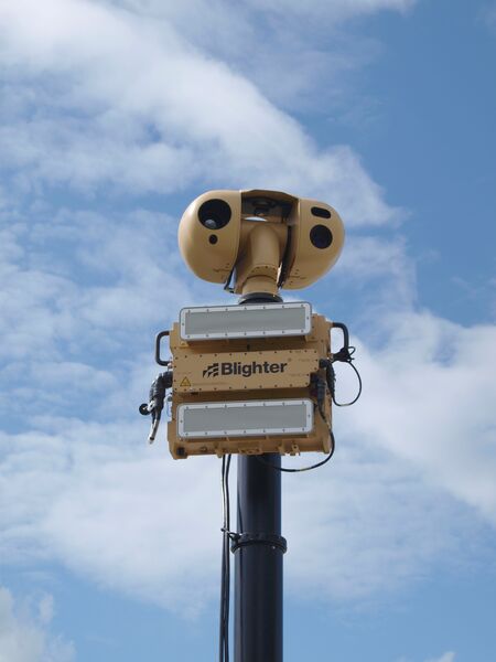 The Blighter Surveillance Systems B402 ground-based target acquisition radar as part of a mast-mounted system with an electro-optical suite above it. (Blighter Surveillance Systems)