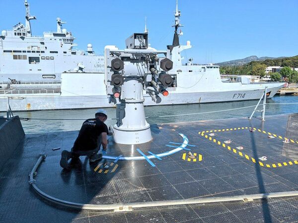 The newly installed Sadral launcher on the starboard side of FS Courbet's hangar roof. Sister ship FS Guépratte, visible behind, is still fitted with the Crotale system.  (Xavier Vavasseur)