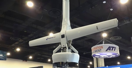 The Martin UAV V-Bat 128 vertical take-off and landing (VTOL) tail-sitting fixed-wing unmanned aerial vehicle (UAV) on display at the Navy League's 2021 Sea-Air-Space exposition on 3 August 2021.