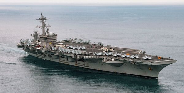 
        A small number of F-35Cs can be seen on the flight deck of USS
        Carl Vinson
        as it departs San Diego, although a number may have been located below deck.
       (US Navy)