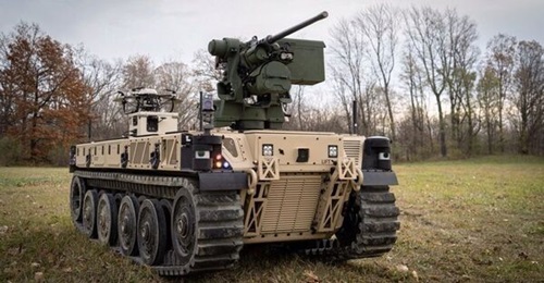 A US Army Remote Combat Vehicle - Light (RCV-L) equipped with a Tethered Unmanned Aerial System.