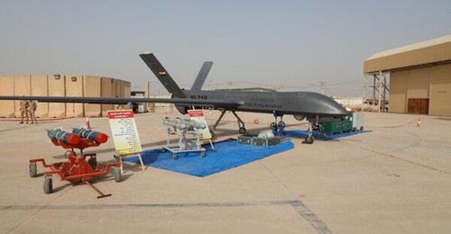 One of the IAAC's CH-4s displayed with AR-1 missiles and FT-9 bombs at Balad Air Base.