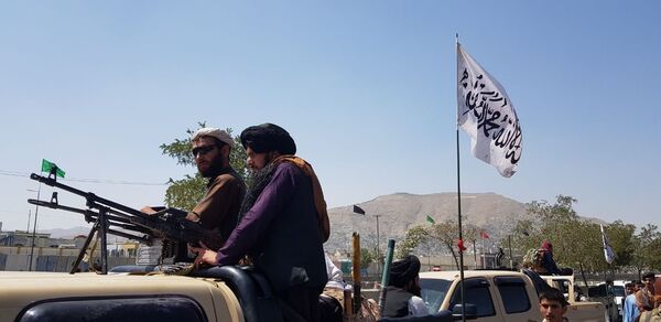 Members of the Taliban patrol the streets of Kabul on 16 August after the Afghan capital fell to the group the previous day. (Sayed Khodaiberdi Sadat/Anadolu Agency via Getty Images)