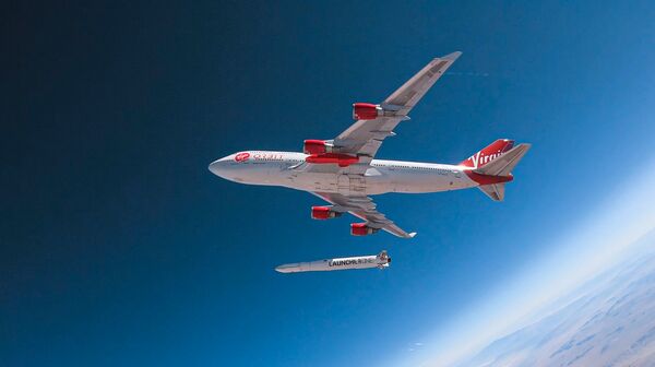 Cosmic Girl, a modified Boeing 747, releases LauncherOne mid-air for the first time during a July 2019 drop test. (Virgin Orbit/Greg Robinson)