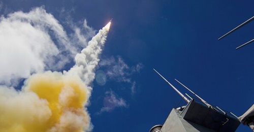 An SM-6 Block I missile arcs skywards following launch from a US Navy DDG-51 guided-missile destroyer. Japan plans to integrate the missile-defence system onto its Atago-class destroyers.