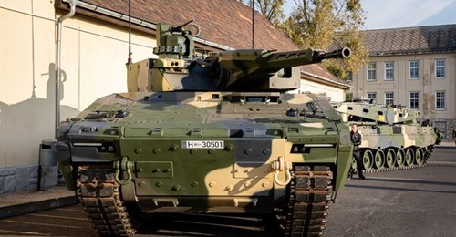 The HDF received the first of 209 Lynx armoured vehicles (foreground) and the first of nine Büffel ARVs (background) from Rheinmetall on 15 October.