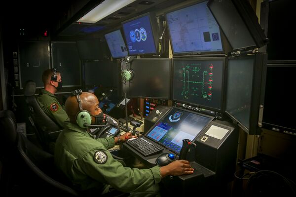 US Marine Corps personnel control a government-owned and government-operated Reaper unmanned aircraft for the first time in late August. (US Marine Corps)