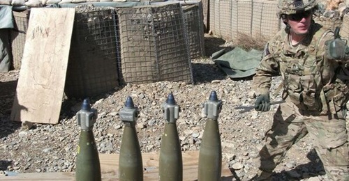 Several US Army conventional 155 mm artillery projectiles outfitted with Northrop Grumman's Precision Guidance Kit.