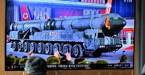 A television screen, on 9 February 2023, showing news of North Korea's military parade, during which the regime carried out its largest-known display of ICBMs.