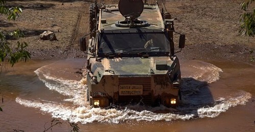 Soldiers from the Indonesian National Armed Forces Peacekeeping Centre conduct driver training on the Bushmaster Protected Mobility Vehicle with the 5th Battalion, Royal Australian Regiment, Darwin, Northern Territory.