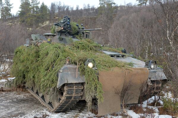 A German Army Marder 1A5 ready to engage a target with its EuroSpike MELLS anti-tank guided weapon mounted to the right of the 20 mm cannon. (Carl Schulze via Rheinmetall)