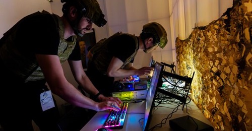 ADF personnel and defence industry officials participate in the Australian Defence Force's Cyber Skills Challenge held in November 2023 in Canberra.