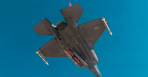A US Air Force Lockheed Martin F-35A Joint Strike Fighter test launches a Kongsberg JSM. The missile, designed for long-range air-to-surface strike, can fit in the F-35's internal weapons bay, allowing the aircraft to preserve its stealth characteristics.