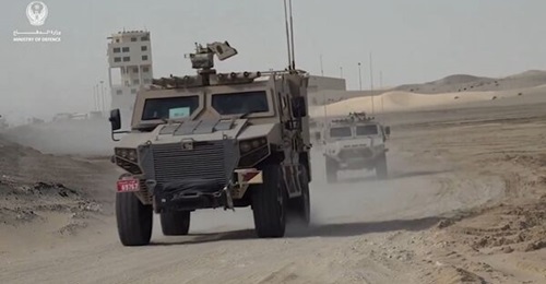 A Nimr Ajban Mk2 during Exercise 'Falcon Strike 3' with an older Ajban model behind.