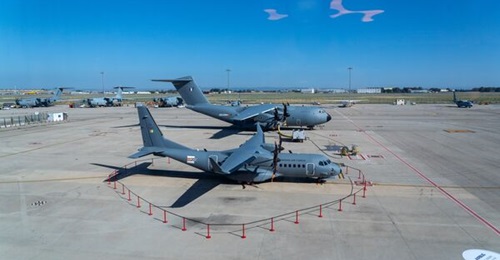 An Airbus C295 aircraft contracted by the IAF stands at Seville, Spain, before its delivery to India in September 2023. In the background is an A400M Atlas for the French Air and Space Force.