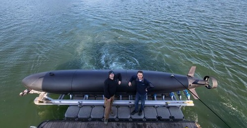 C2 Robotics founders, Michael Bailey (left) and Thomas Loveard, with a Speartooth large unmanned underwater vehicle at a test site. Under a recent collaboration agreement with Thales Australia, Speartooth will be equipped with Thales' sonar system.