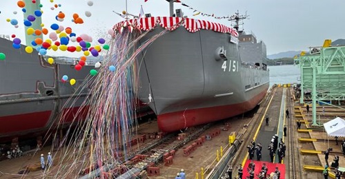 A new type of landing ship being launched for the JGSDF.