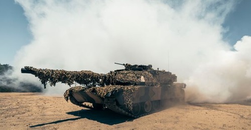 A beach assault undertaken by an Australian M1A1 Abrams main battle tank on Cowley Beach in Queensland as part of Exercise 'Keris Woomera'.