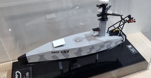 A model of Couach's 600 USV on display at Euronaval 2024.