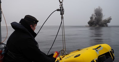 The Finnish Navy mine-hunting vessel FNS 
        
         is pictured participating in historical ordnance disposal operations (HODOPS) while working with NATO's SNMCMG1 in April 2024.