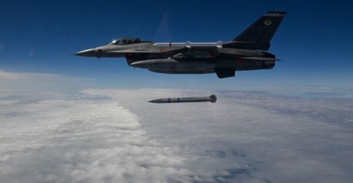 An F-16 from Eglin AFB drops an inert Stand-in Attack Weapon for the first time on 7 November over the Gulf of Mexico.