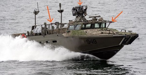 Saab maritime live training. A Combat Boat 90 fitted with the modular target system and a laser projector on the remote weapon station.