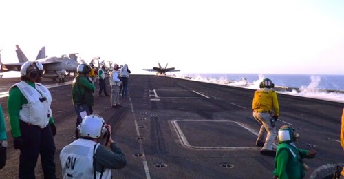 The US Navy has been using carrier-launched aircraft in Red Sea operations, like those shown here aboard USS 
        
         to thwart attacks.
