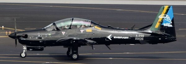 An undisclosed customer has signed for six A-29 Super Tucanos. Embraer forecasts a 490-strong market for the type over the next two decades.