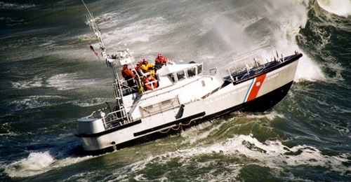 The US Coast Guard says it needs Special Purpose Craft - Heavy Weather (SPC-HWX) II because 47 ft motor lifeboats, like the one shown here operating in the US Northwest Pacific Ocean surf, are not capable enough.