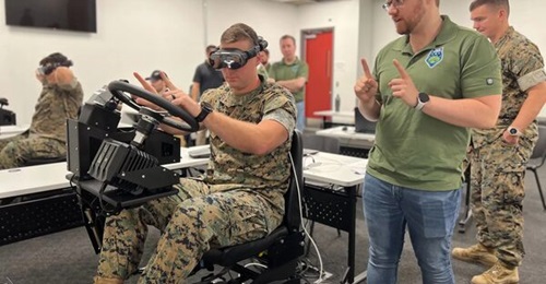 A USMC trainee using the Wave Warrior ACV-DTS with an instructor from the XR Training consortium.