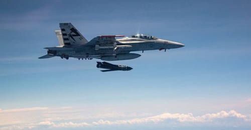An AGM-158C LRASM missile is launched from an F/A-18E/F Super Hornet during testing in 2019. The F-15E and F-15EX are to be the second tactical aircraft to receive the LRASM capability.