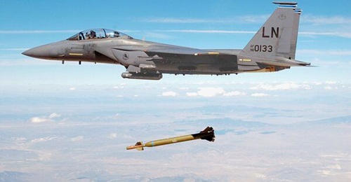 An F-15E of the 492nd Fighter Squadron dropping a GBU-28 'bunker buster'. The EPAWSS retrofits purchased under the full-rate contract will allow the F-15E a greater ability to penetrate enemy air defences.