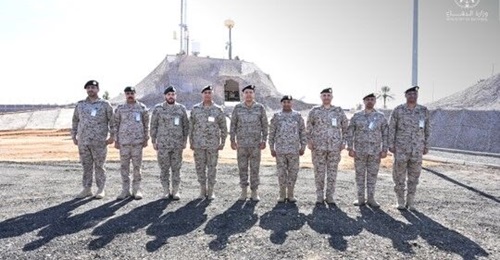 Lieutenant General Fahd al-Ghufaili, centre, stands in front of the previously unseen counter-UAV system during an inspection of the Northwest Region Command.