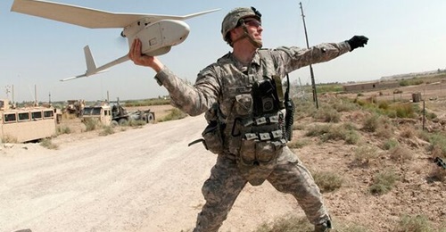 A file photo of a US Army soldier launching a Raven unmanned aerial vehicle of the type that is now to be donated to North Macedonia along with the Puma.
