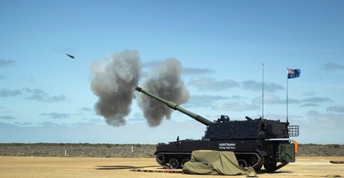 An Australian Army AS9 Huntsman self-propelled howitzer test-fires a practice round at the Proof and Experimental Establishment in Port Wakefield, South Australia.
