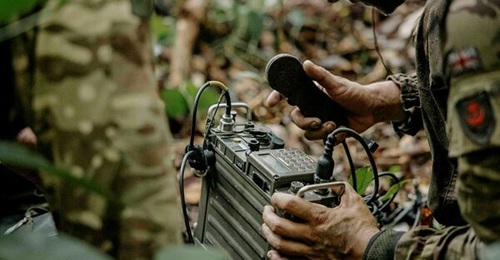 A British Army soldier from 1 Royal Gurkha Rifles seen using an L3Harris AN/PRC-167 Multi-channel Manpack radio during the Brunei Jungle Warfare Skills Meet Patrolling Competition on 20 November 2024.