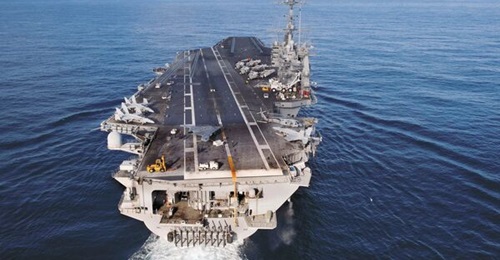 USS 
        
        , pictured here testing a new unmanned aircraft in 2012, collided with a commercial ship in the Mediterranean Sea.