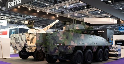 The Patria AMV XP 8×8 vehicle (right) was exhibited at DSEI 2023 with the Rafael Samson 30 remote weapon system and is also equipped with a Vegvisir camera system, Bittium software-defined radio system, and Savox wireless intercom.