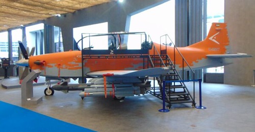 The B-250T trainer displayed fitted with an electro-optical system and weapons hardpoints at IDEX 2025.