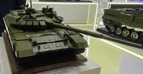 Scaled model of the Arena-E on a T-72 main battle tank.